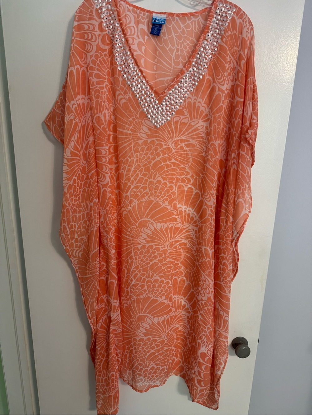Soaked orange and white cover. L/XL
